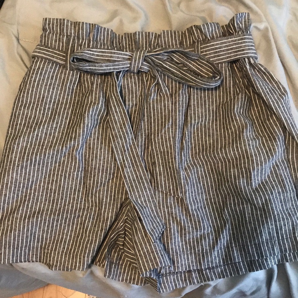 Grey and white stripped shorts.